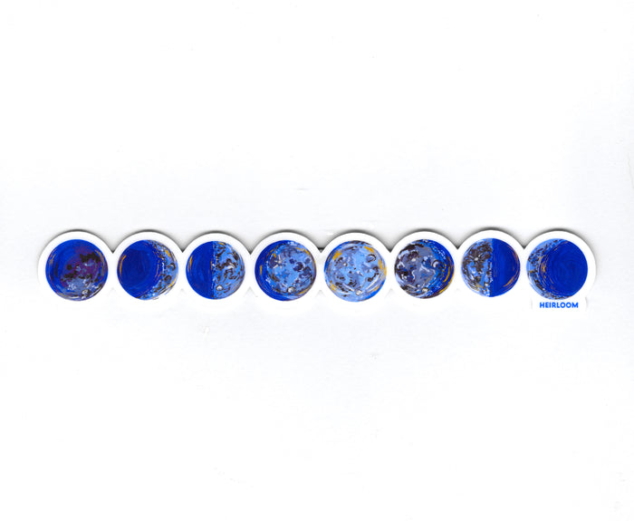 Vinyl sticker featuring the phases of the moon. This sticker is a hand painted design that has been reprinted on durable vinyl and is a design that is custom to Heirloom.