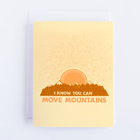 A light beige greeting card with a dark orange mountain scape and a light pink sun setting behind the mountains. The text below reads I know you can move mountians.